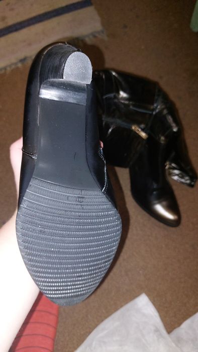 Високі чоботи на підборі