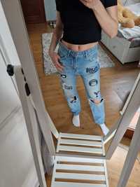 Jeansy z dziurami i naszywkami mom jeans Berskha
