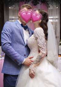 Розкішна пишна весільна сукня в кольорі айворі