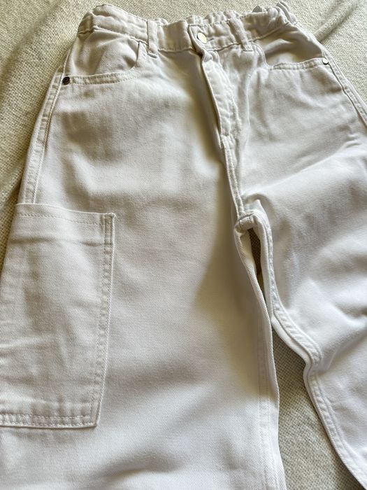 Білі джинси з кишенями 164см