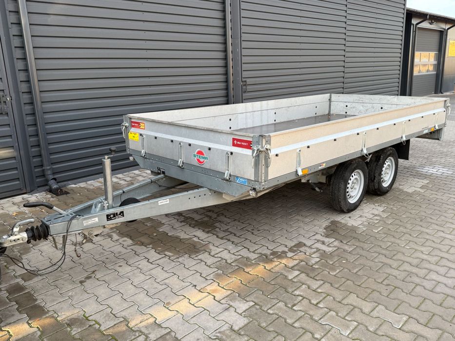 Przyczepa samochodowa STEMA burtowa platforma 2 osie 2.7dmc
