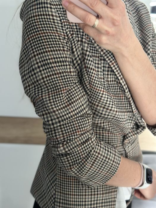 Стильний піджак в клітинку