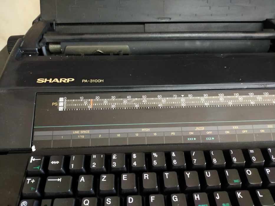 Máquina de escrever elétrica Sharp