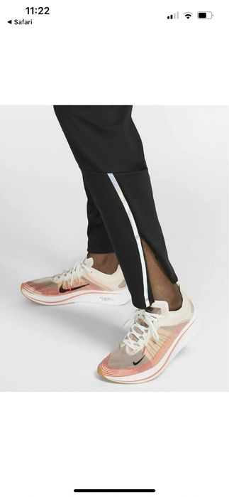 Нові оригінальні менакруті штани для бігу nike swift shield