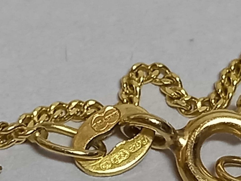 Wisiorek, przywieszka z topazem blu i diamentami, złoto 9K, poł. XX w.