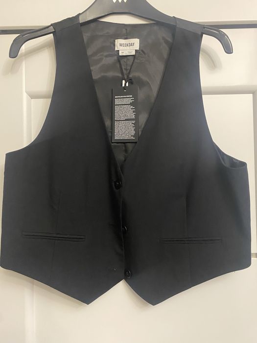 Нова жіноча жилетка , розмір L