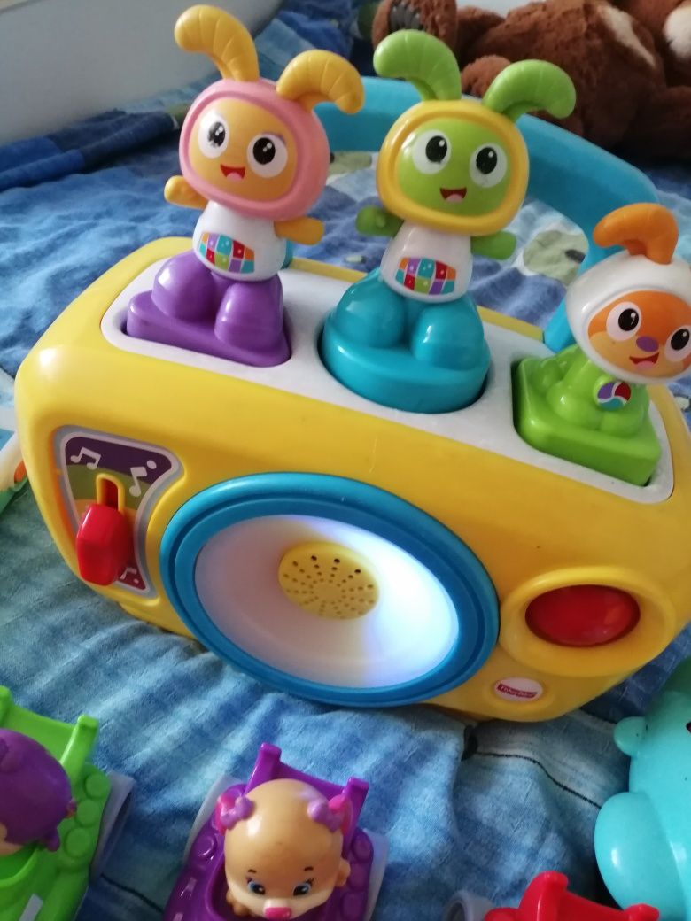 Zestaw zabawek fisher price telefon szczeniaczka radio grające samoch