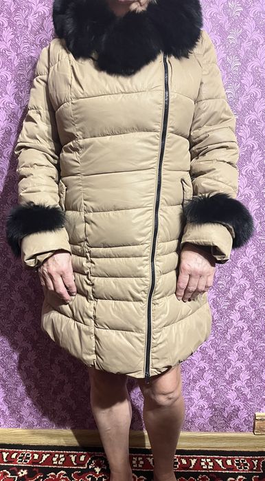 Продам пуховик .