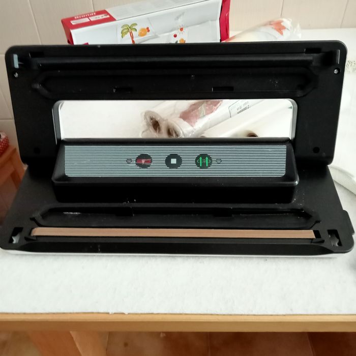 Aparelho  embalar sob vácuo e rolos