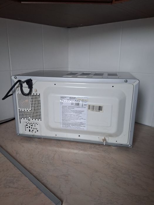 Mikrofalówka Amica mało używaną szara czarna szkło rozmrażanie sprawna