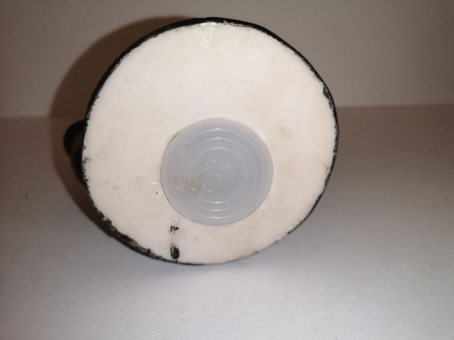 Skarbonka w kształcie pieska w konewce