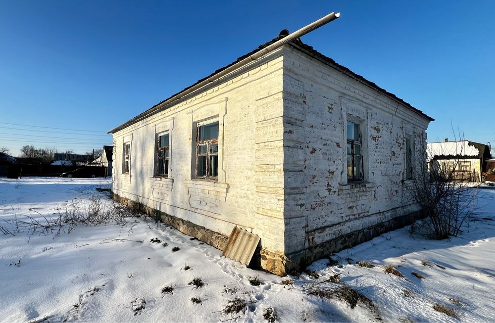 Будинок з земельною ділянкою