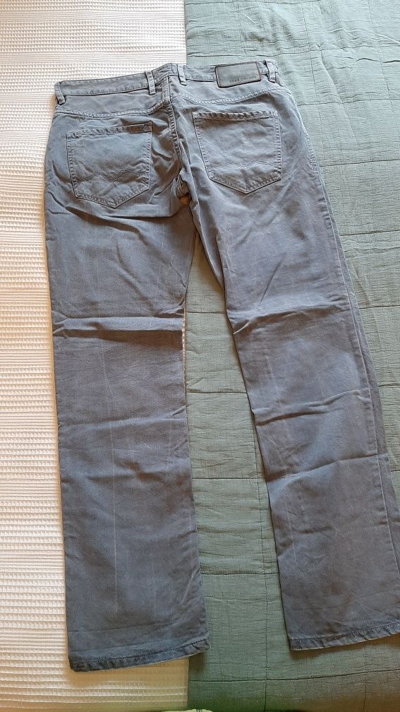 Spodnie , dżinsy firmy Hugo Boss, Orange 24 Barcelona. Szaro niebieski