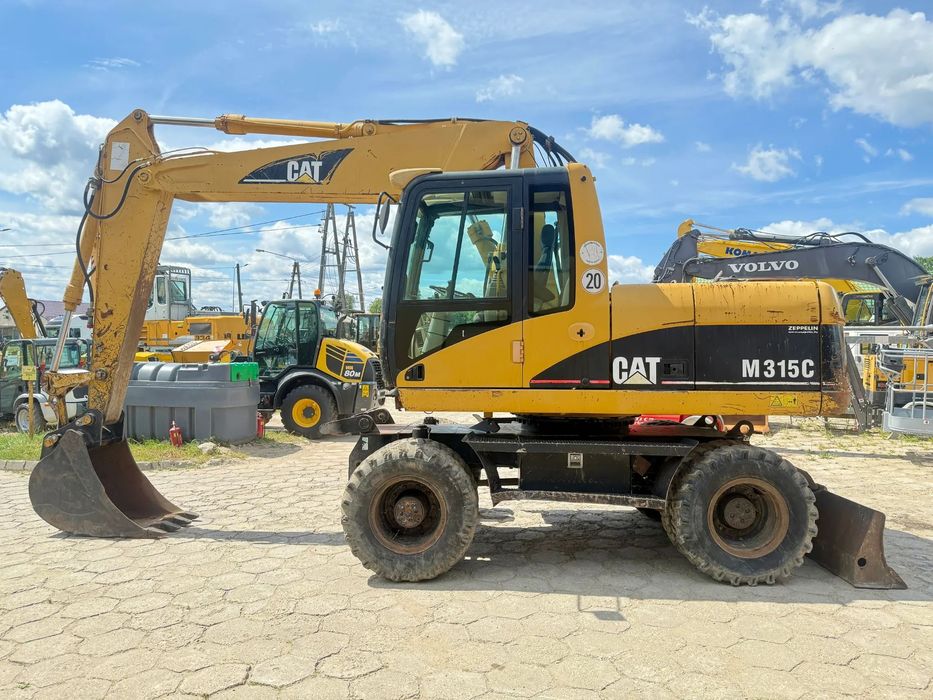 Caterpillar CAT koparka kołowa M315C 315 klimatyzacja ZAMIANA  obrotowa obrotówka