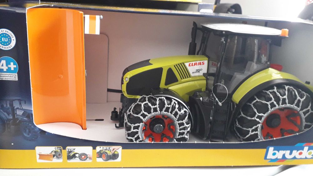 Bruder zabawka Traktor Claas Axion 950 z pługiem i łańcuch nowość