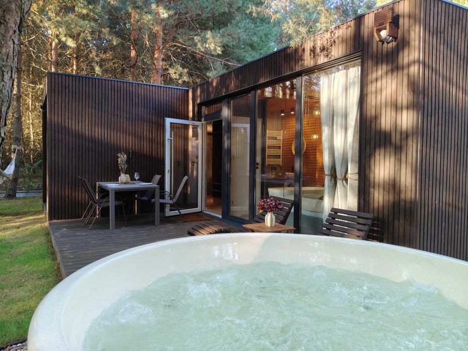 Domki na wynajem w lesie pod Warszawą - jacuzzi i sauna