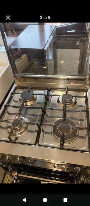Продам газову пічку з елекричною духовкою -гріль.