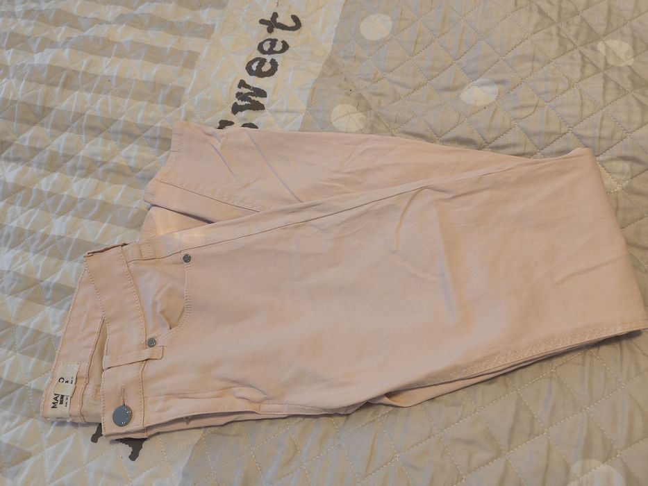 Woskowane spodnie S Mango