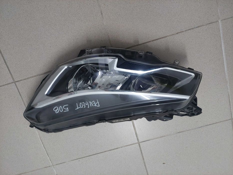 farol esq Peugeot 508