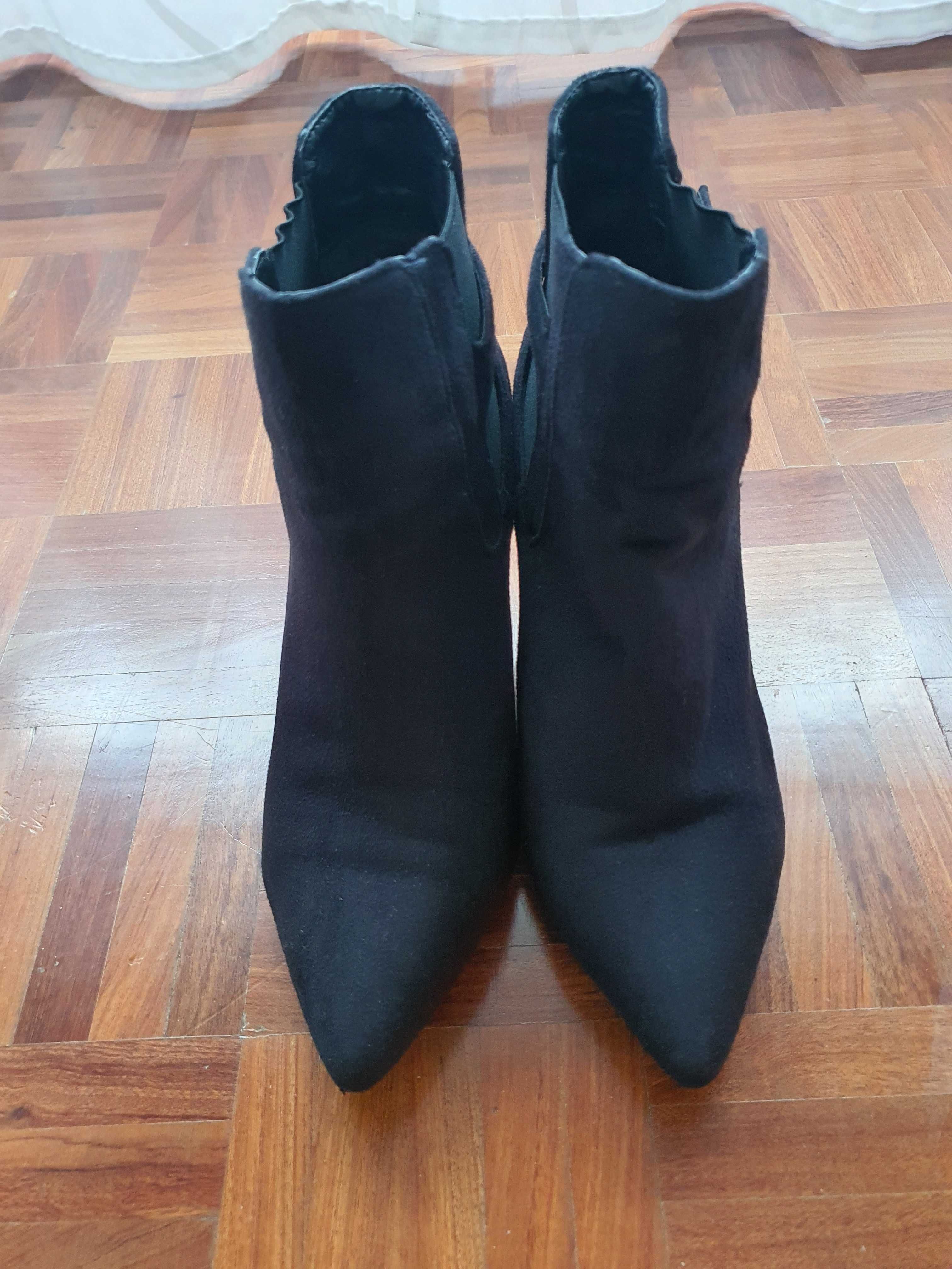 Botas de salto alto