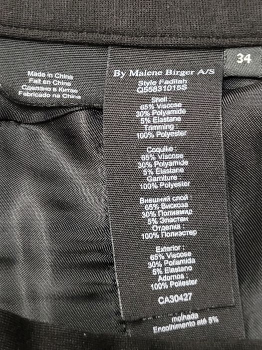 Eleganckie spodnie cygaretki premium suwaki po bokach styl preppy
