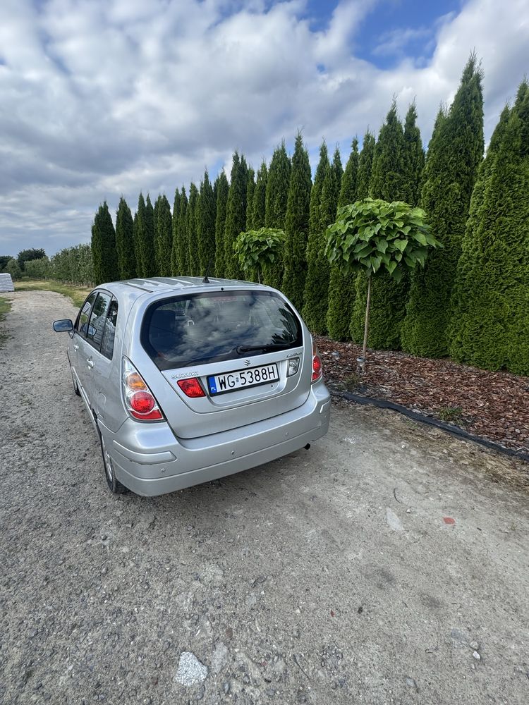 Suzuki Liana 1,6 benzyna , 125 koni , sprawy