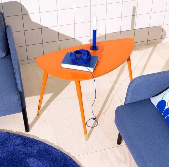 Vibrant artsy leaf-shaped orange coffee table