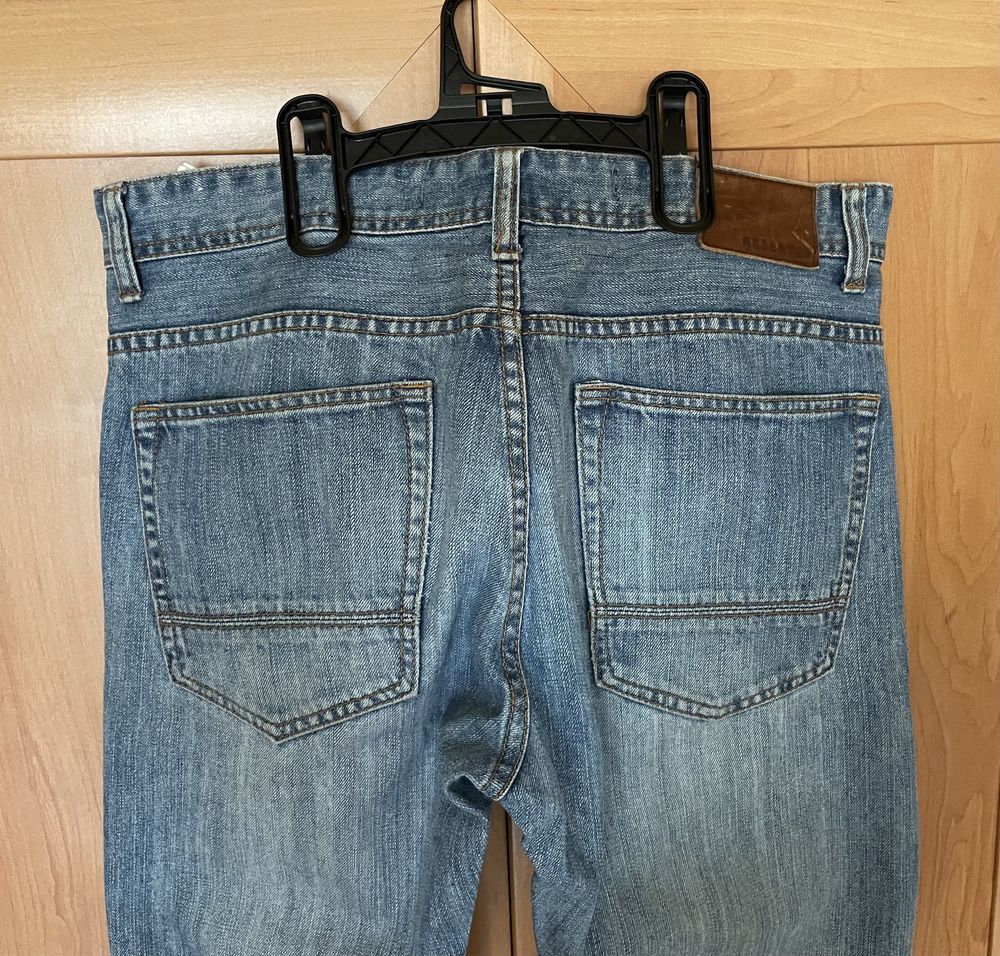 Spodnie jeansy dżinsowe Reserved W33 L34