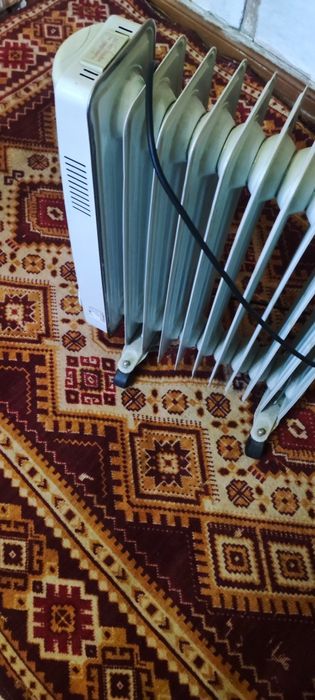 Бытовой масленный радиатор.