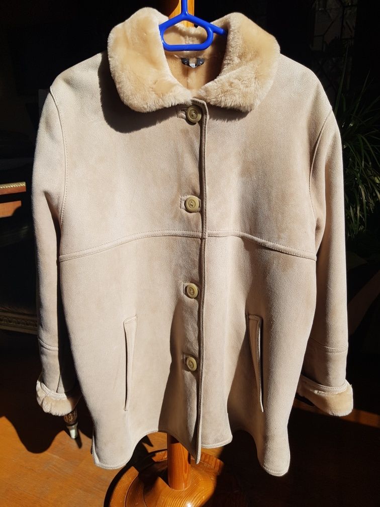 Lindo, elegante e confortável casaco pele genuina usado poucas vezes