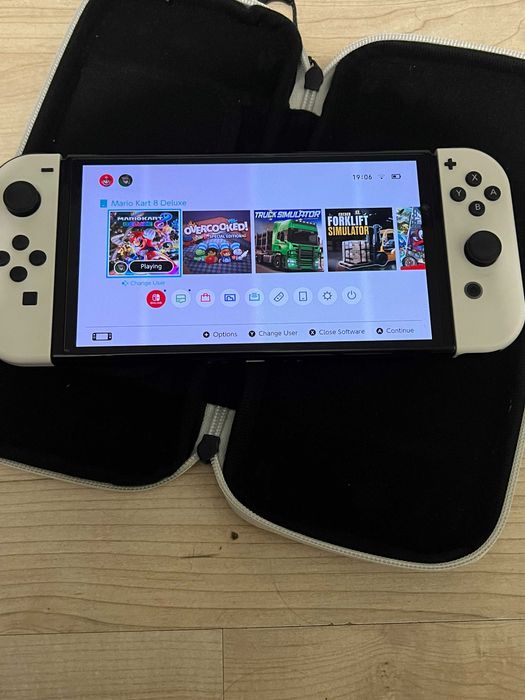 Nintendo Switch OLED + komplet + oryginalne etui Nintendo