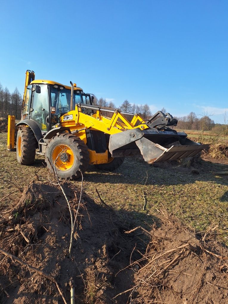 Usługi koparko‐ładowarka ,koparka, koparka long, solówka, niskopodwozi