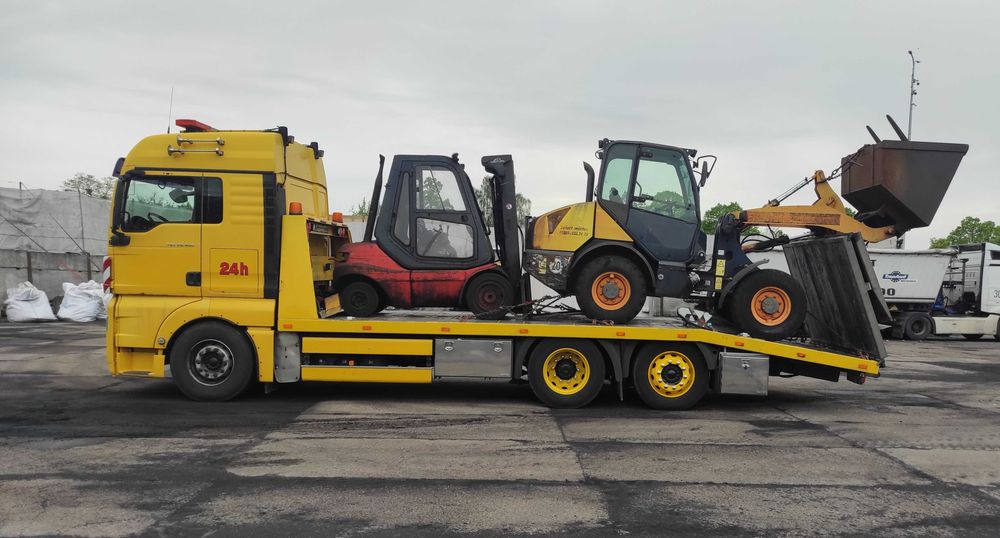 Transport maszyn rolniczych, budowlanych, traktory, pomoc drogowa