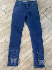 Spodnie jeans Msara