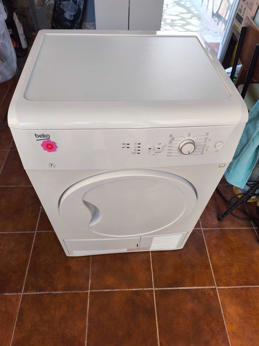 Máquina secar roupa