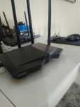 Router tenda com cabo de rede e wireless
