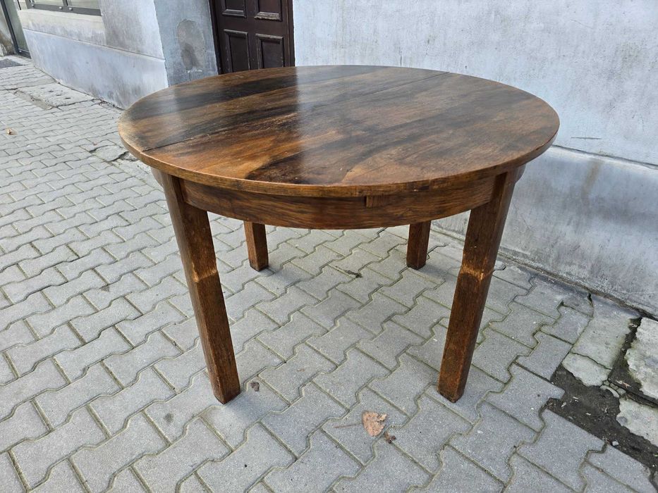 Stary duży okrągły rozkładany stół