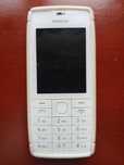 Nokia 515 + ładowarka + słuchawki + 2 etui