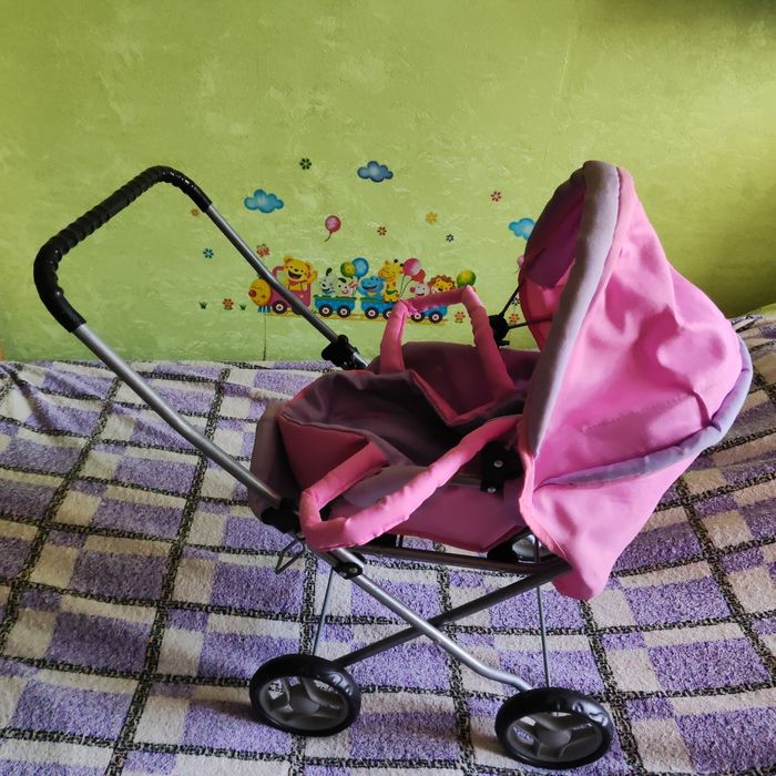 Дитяча коляска для ляльок