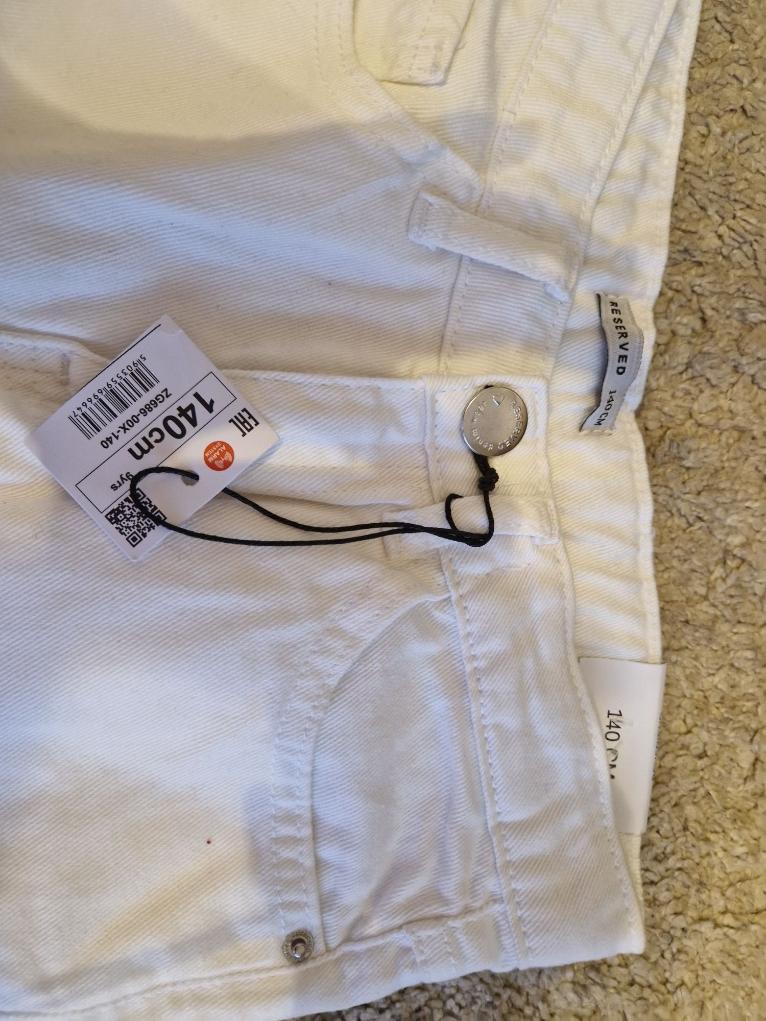Spodnie białe chłopięce Reserved 140