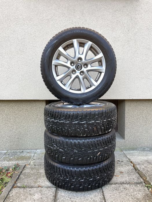 Koła zimowe alufelgi Mazda Nokian 205/60 R16 4szt. oryginalne 5x114,3
