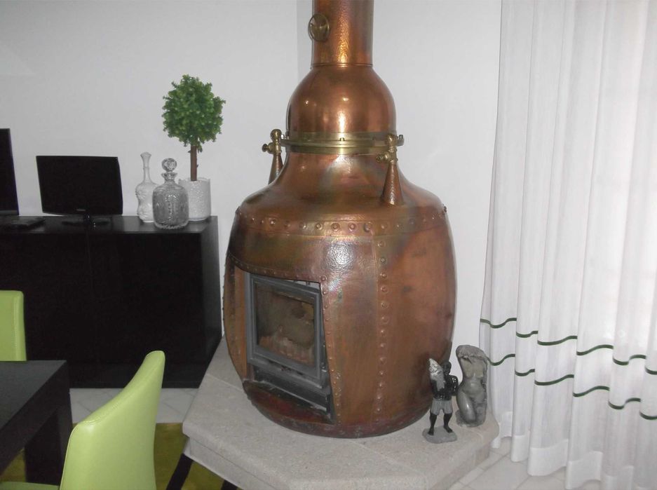 Fogão em cobre martelado.
