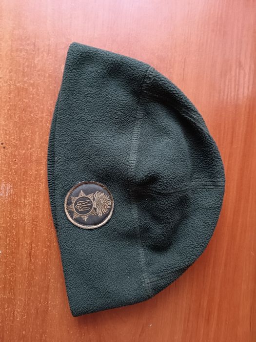 Продам оливові шапкі нгу б/у