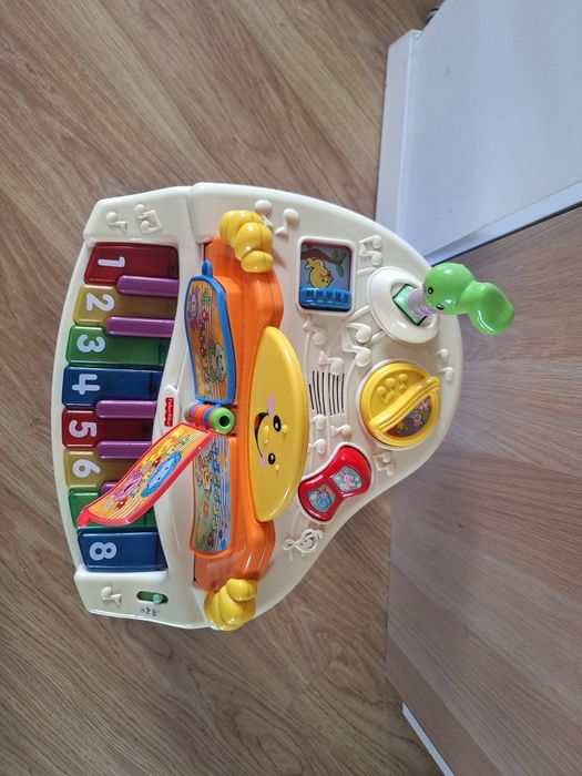 Pianino Fisher Price, stolik interaktywny, zabawki intwraktywne
