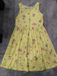 Sukienka żółta w kwiaty H&M r. 134/140.