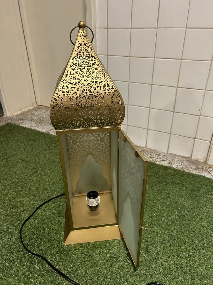 Vendo candiero dourado como novo