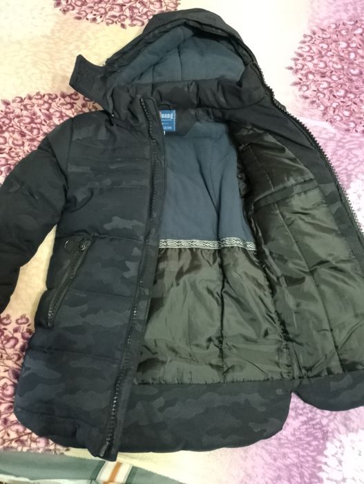 Продам зимову куртку на підлітка 12-13 років.