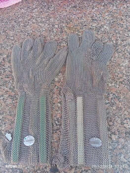 Luvas de malha de aço