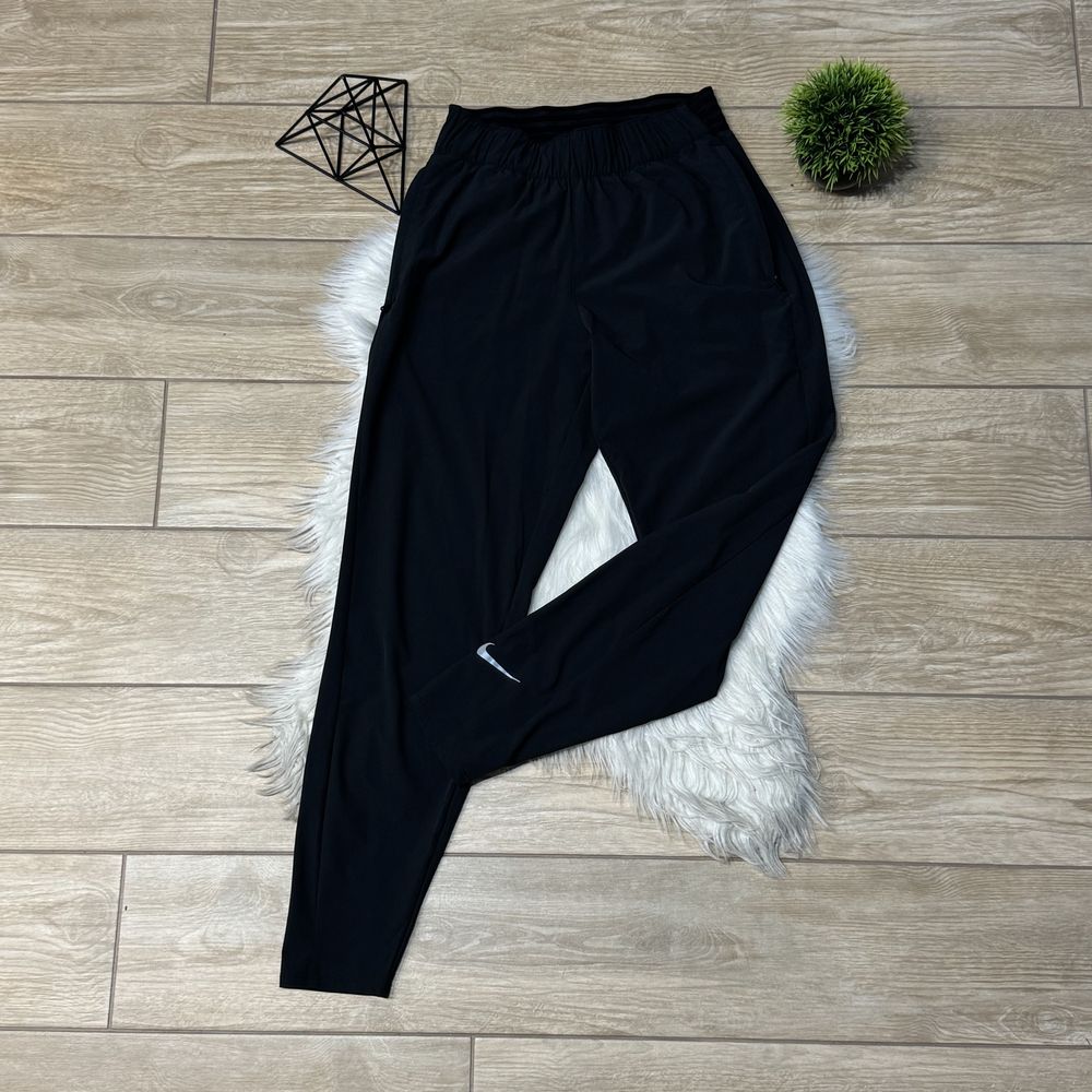 Легкі жіночі нейлонові спортивні штани nike xs оригінал