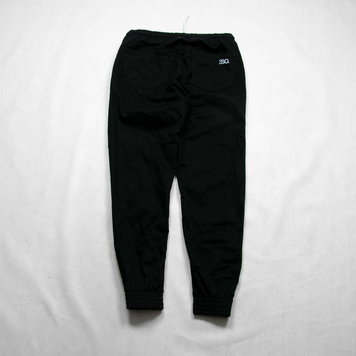 SSG spodnie joggery L męskie logowane